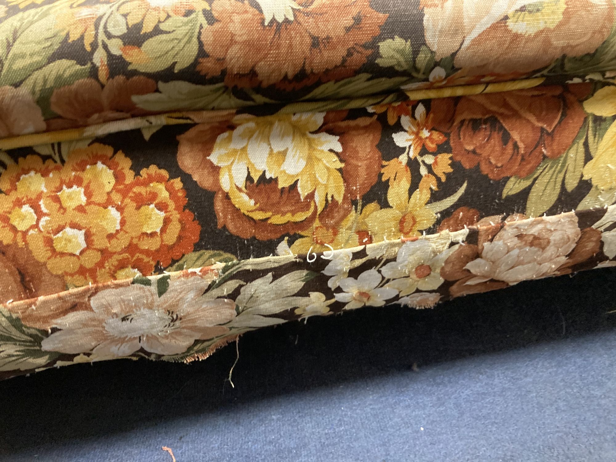 A Victorian floral upholstered Chesterfield settee, length 200cm, depth 85cm, height 68cm